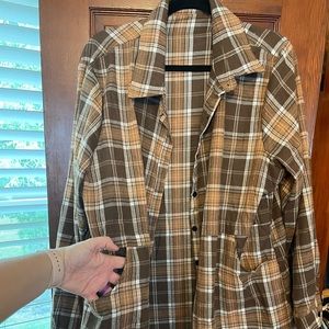 Long sleeve plaid shirt. Longer length.